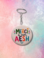 Porte-clé décapsuleur illustré "Merci"